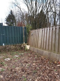 Kunstgras in combinatie met sierbestrating